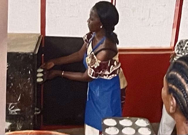 Liberia 24 MHA baking in the charcoal oven