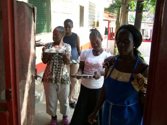 Liberia Bringing muffins for Baking